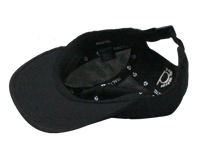 Upside down black hat showing the inside mesh parts. The cap is made of 100% recycled polyester.