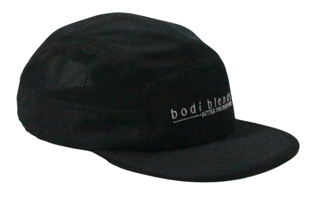 Other side panel of a black hat with part of the white Bodi Blends logo stitching showing on the front panel. The cap is made of 100% recycled polyester.