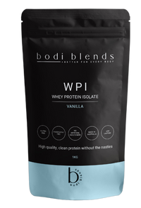 Front of a stand up pouch of vanilla flavoured whey protein isolate powder. The label shows the brand name, product name, size and some nutritional information. The powder is in a resealable, black plastic stand up pouch with a blue strip along the bottom.